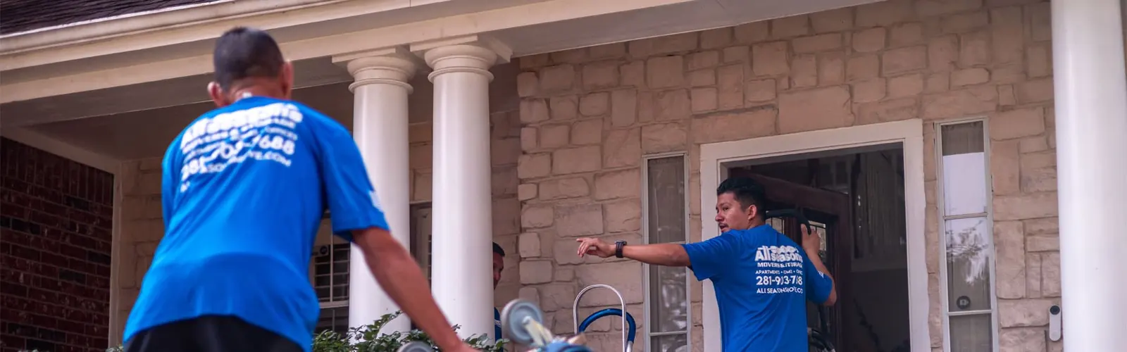 Movers at the front door of a Sugar Land home