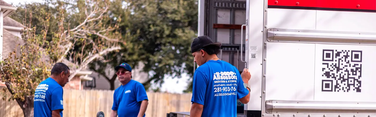 Movers loading a moving truck in Sugar Land, TX